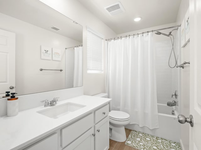 6274 E Riesling Dr, Fresno, CA 93727 - bathroom featuring vanity, shower / bath combination with curtain, wood finished floors, and recessed lighting