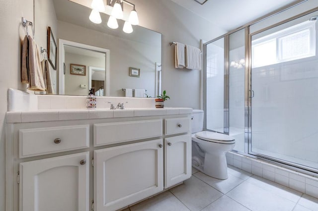 3084 Magnolia Ave, Clovis, CA 93611 - bathroom with vanity, a stall shower, and tile patterned floors