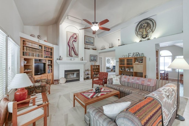 3084 Magnolia Ave, Clovis, CA 93611 - carpeted living room featuring a ceiling fan, a brick fireplace, high vaulted ceiling, and built in features