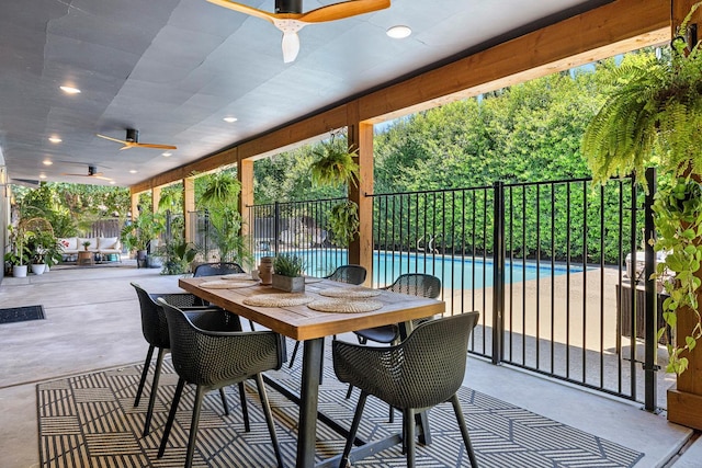 6054 N Kavanagh Ave, Fresno, CA 93711 - fenced backyard featuring a ceiling fan, outdoor dining area, and a patio area