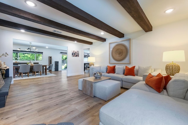 6054 N Kavanagh Ave, Fresno, CA 93711 - living room featuring light wood-style floors, beam ceiling, recessed lighting, and a chandelier