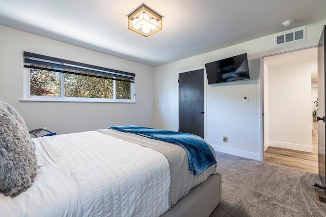 6054 N Kavanagh Ave, Fresno, CA 93711 - carpeted bedroom featuring baseboards