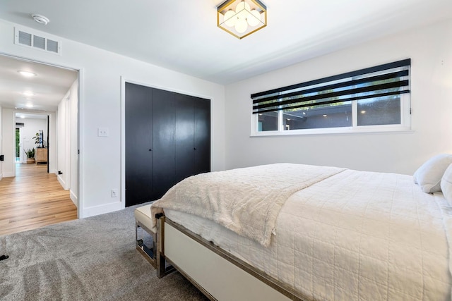 6054 N Kavanagh Ave, Fresno, CA 93711 - carpeted bedroom featuring a closet and baseboards