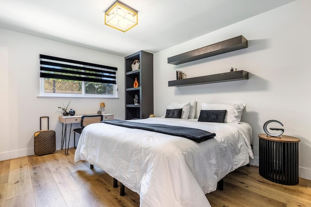6054 N Kavanagh Ave, Fresno, CA 93711 - bedroom featuring wood finished floors