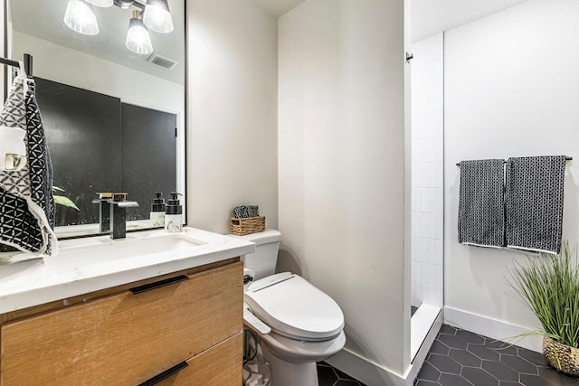 6054 N Kavanagh Ave, Fresno, CA 93711 - bathroom featuring tile patterned flooring, vanity, and walk in shower