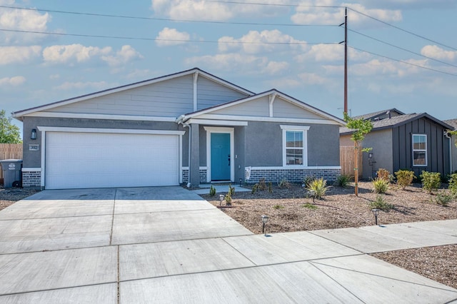 2012 Richard Ave, Sanger, CA 93657 - single story home with driveway, a garage, and stucco siding