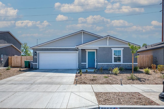 2012 Richard Ave, Sanger, CA 93657 - ranch-style house with an attached garage, concrete driveway, and brick siding