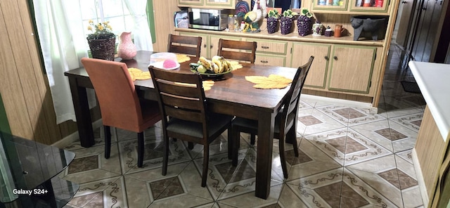 3415 E Lincoln Ave, Fresno, CA 93725 - dining room featuring light tile patterned floors