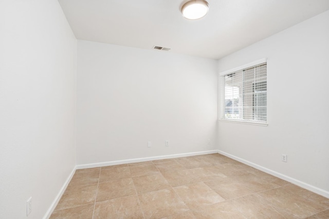 5647 N Tracy Ave, Fresno, CA 93722 - empty room featuring baseboards
