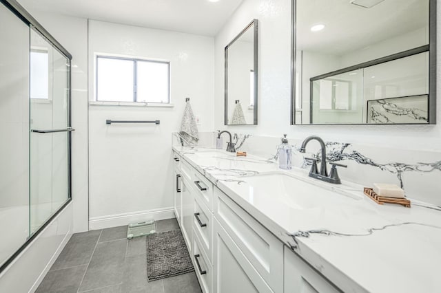 3377 N Bryan Ave, Fresno, CA 93723 - bathroom featuring double vanity, shower / bath combination with glass door, recessed lighting, and tile patterned floors