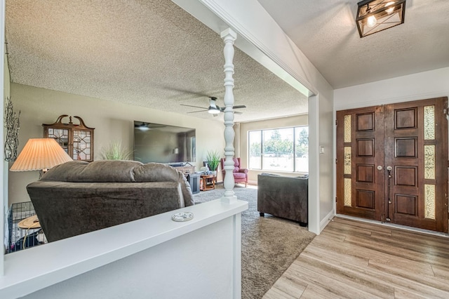 3377 N Bryan Ave, Fresno, CA 93723 - foyer with a textured ceiling, ceiling fan, and light wood finished floors