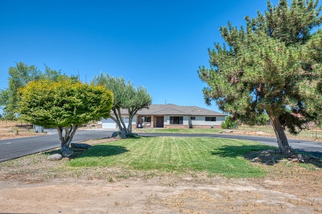 3377 N Bryan Ave, Fresno, CA 93723 - single story home featuring a front lawn