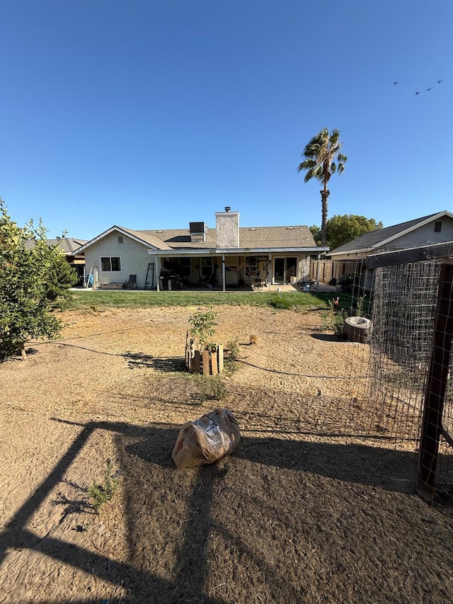 2662 Yerba St, Selma, CA 93662 - back of house with a chimney