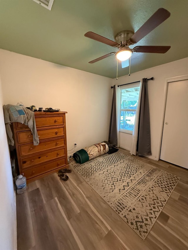 2662 Yerba St, Selma, CA 93662 - bedroom with wood finished floors and a ceiling fan