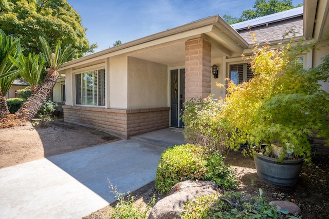 6372 N Benedict Ave, Fresno, CA 93711 - property entrance with stucco siding and brick siding