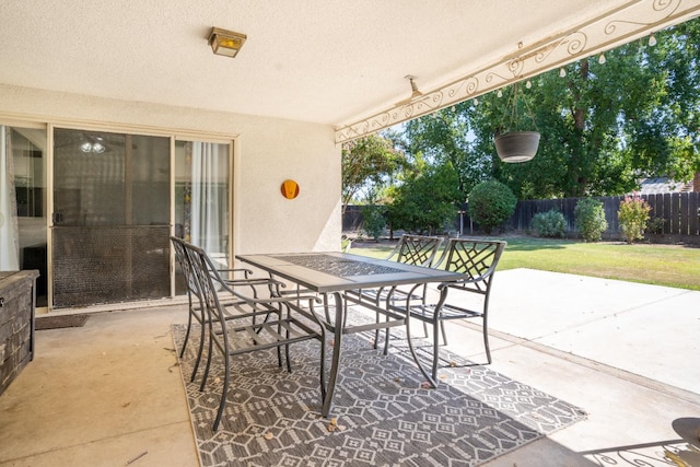 6372 N Benedict Ave, Fresno, CA 93711 - fenced backyard featuring a patio area and outdoor dining space