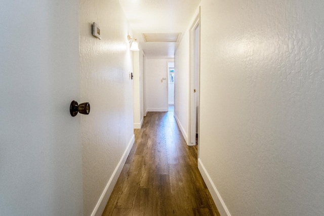 6372 N Benedict Ave, Fresno, CA 93711 - corridor featuring wood finished floors and attic access