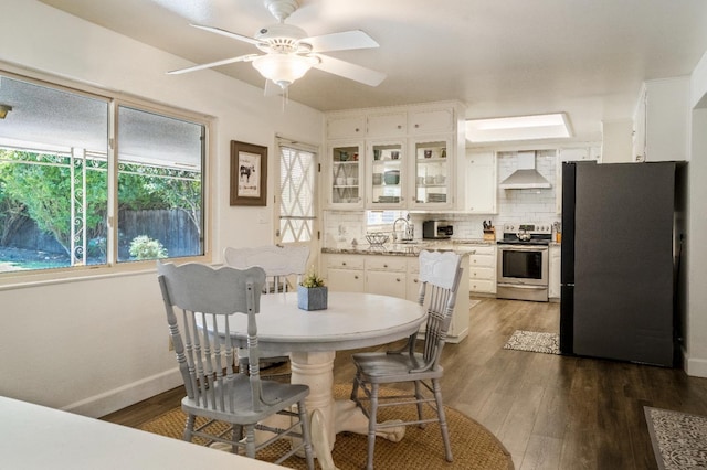 6372 N Benedict Ave, Fresno, CA 93711 - dining room featuring dark wood-type flooring and ceiling fan