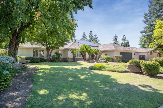 6372 N Benedict Ave, Fresno, CA 93711 - single story home with an attached garage, a front yard, and stucco siding