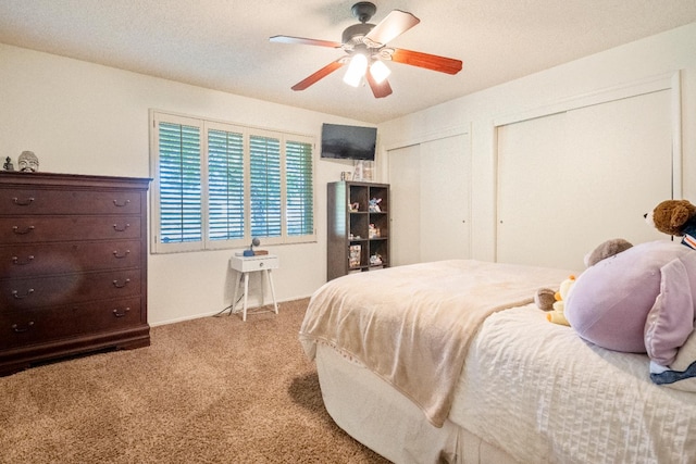 6372 N Benedict Ave, Fresno, CA 93711 - bedroom with carpet flooring, two closets, and ceiling fan