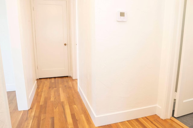 4119 Arden Dr S, Fresno, CA 93703 - corridor featuring light wood-style flooring and baseboards