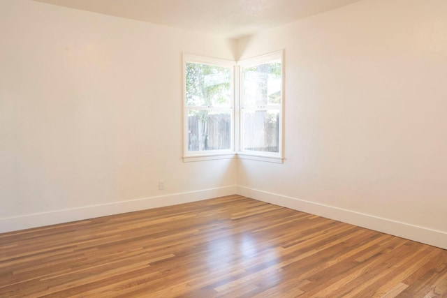 4119 Arden Dr S, Fresno, CA 93703 - empty room with baseboards and light wood-style floors