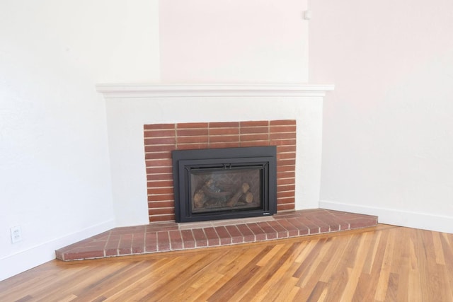 4119 Arden Dr S, Fresno, CA 93703 - detailed view of a tiled fireplace and wood finished floors