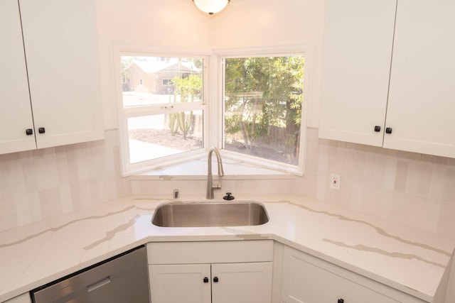 4119 Arden Dr S, Fresno, CA 93703 - kitchen featuring dishwasher, white cabinets, tasteful backsplash, and light stone countertops