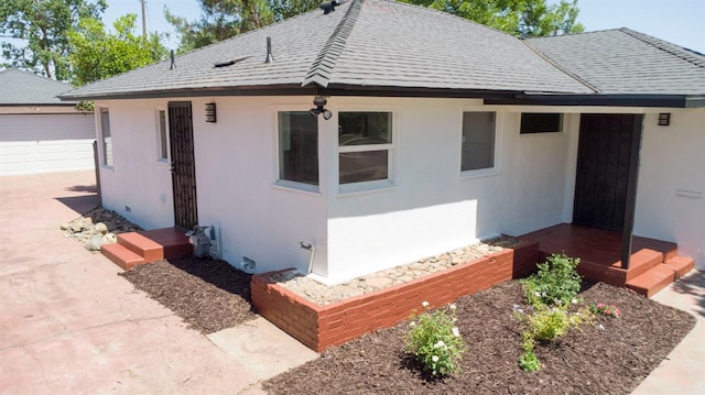 4119 Arden Dr S, Fresno, CA 93703 - view of front of home featuring roof with shingles, stucco siding, and a garage