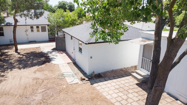 4119 Arden Dr S, Fresno, CA 93703 - view of property exterior featuring stucco siding and a patio