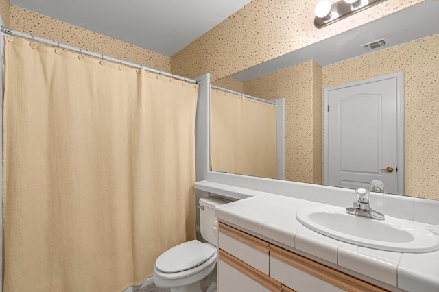 1210 E Province Dr, Fresno, CA 93720 - bathroom featuring wallpapered walls, vanity, and a shower with shower curtain