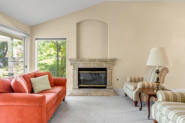 1210 E Province Dr, Fresno, CA 93720 - living area featuring vaulted ceiling, carpet, and a premium fireplace