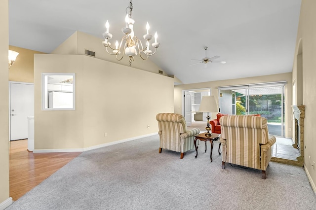 1210 E Province Dr, Fresno, CA 93720 - living area featuring a ceiling fan, vaulted ceiling, carpet, and a chandelier