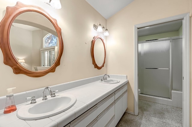 1210 E Province Dr, Fresno, CA 93720 - bathroom featuring double vanity, a stall shower, and lofted ceiling