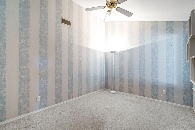 1210 E Province Dr, Fresno, CA 93720 - carpeted empty room with a ceiling fan and wallpapered walls