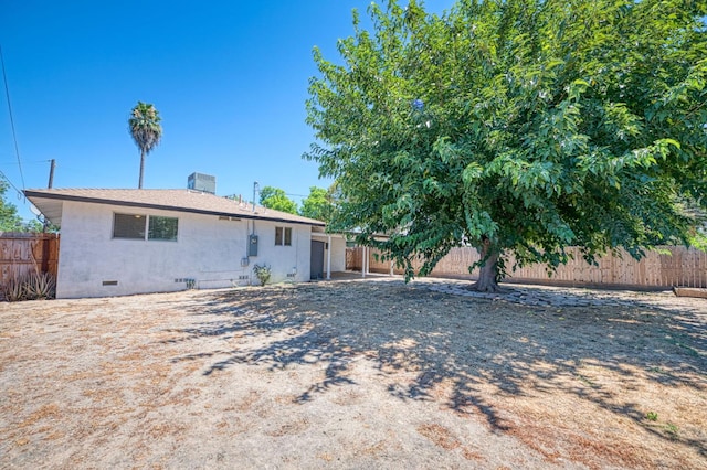1821 W Lansing Way, Fresno, CA 93705 - back of house featuring crawl space, a fenced backyard, and a chimney