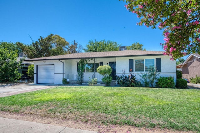 1821 W Lansing Way, Fresno, CA 93705 - ranch-style house featuring stucco siding, a garage, a front lawn, and driveway