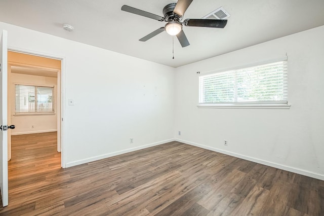 1821 W Lansing Way, Fresno, CA 93705 - spare room featuring wood finished floors, a ceiling fan, and a smoke detector