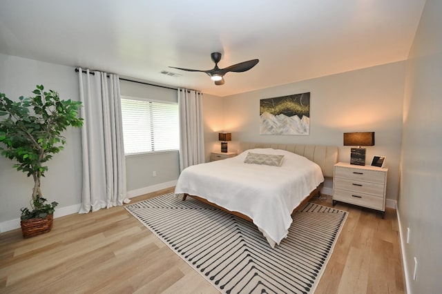 25190 Elwood Rd, Sanger, CA 93657 - bedroom with light wood-style floors and ceiling fan