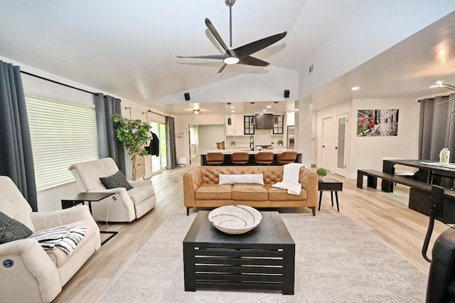 25190 Elwood Rd, Sanger, CA 93657 - living area featuring a ceiling fan, light wood finished floors, and high vaulted ceiling