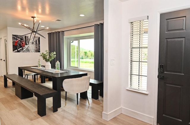 25190 Elwood Rd, Sanger, CA 93657 - dining area with a chandelier, light wood-type flooring, and recessed lighting