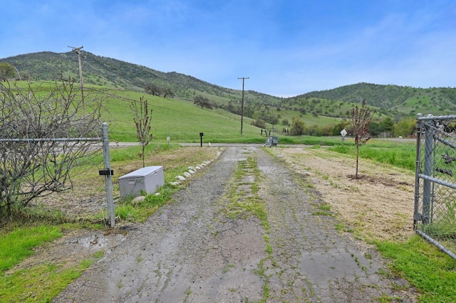 25190 Elwood Rd, Sanger, CA 93657 - view of dirt / gravel road with a mountain view and a view of countryside