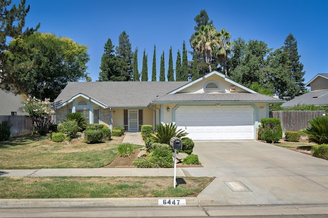 6447 N Vagedes Ave, Fresno, CA 93711 - single story home with concrete driveway and a garage