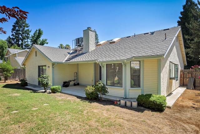 6447 N Vagedes Ave, Fresno, CA 93711 - back of house with a chimney, a patio area, and a shingled roof