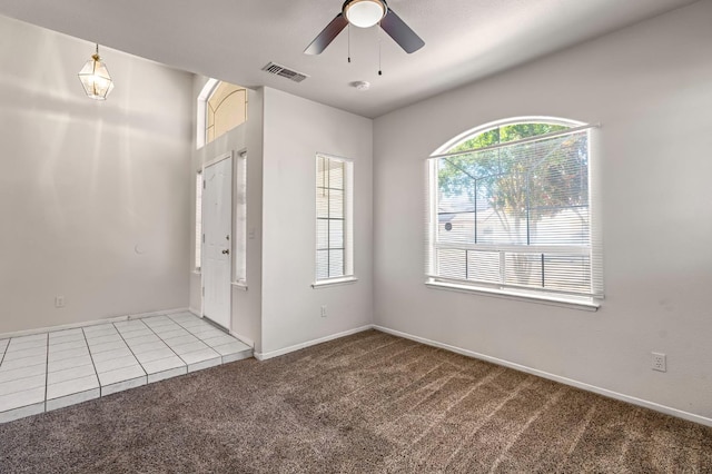 5811 W Beechwood Ave, Fresno, CA 93722 - carpeted spare room with a ceiling fan and a smoke detector