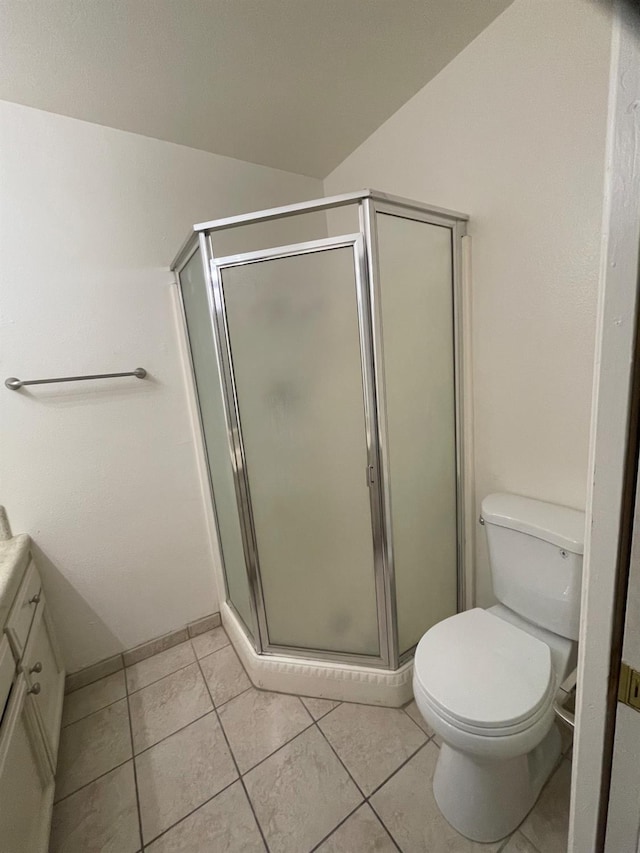 1027 W Dakota Ave Unit 102, Fresno, CA 93705 - bathroom with vanity, a shower stall, and tile patterned floors
