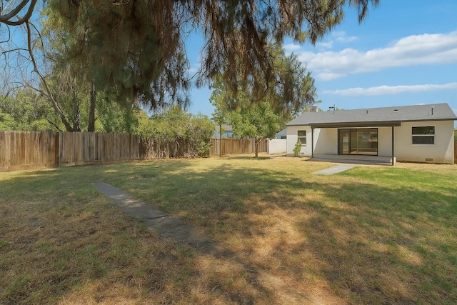 1402 E Shields Ave, Fresno, CA 93704 - fenced backyard featuring a patio