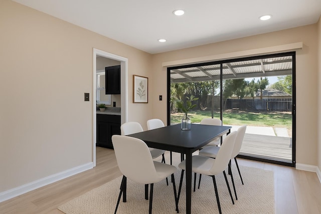 1402 E Shields Ave, Fresno, CA 93704 - dining area with light wood finished floors, healthy amount of natural light, and recessed lighting