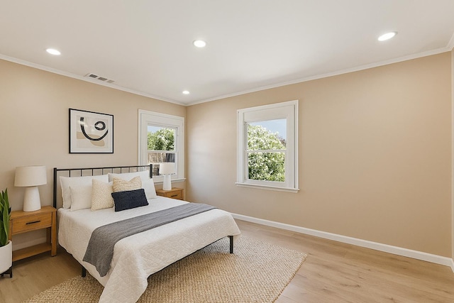 1402 E Shields Ave, Fresno, CA 93704 - bedroom with crown molding, light wood-type flooring, and recessed lighting