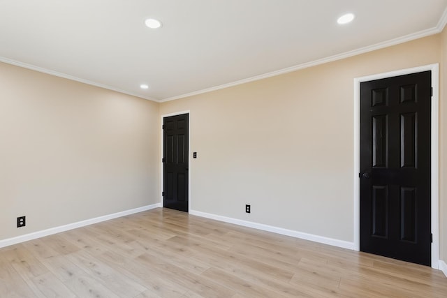 1402 E Shields Ave, Fresno, CA 93704 - empty room featuring crown molding, recessed lighting, and light wood finished floors